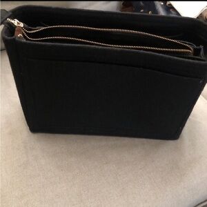 Unbranded black Purse insert.